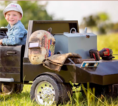 Power wheels ride on top flatbed truck